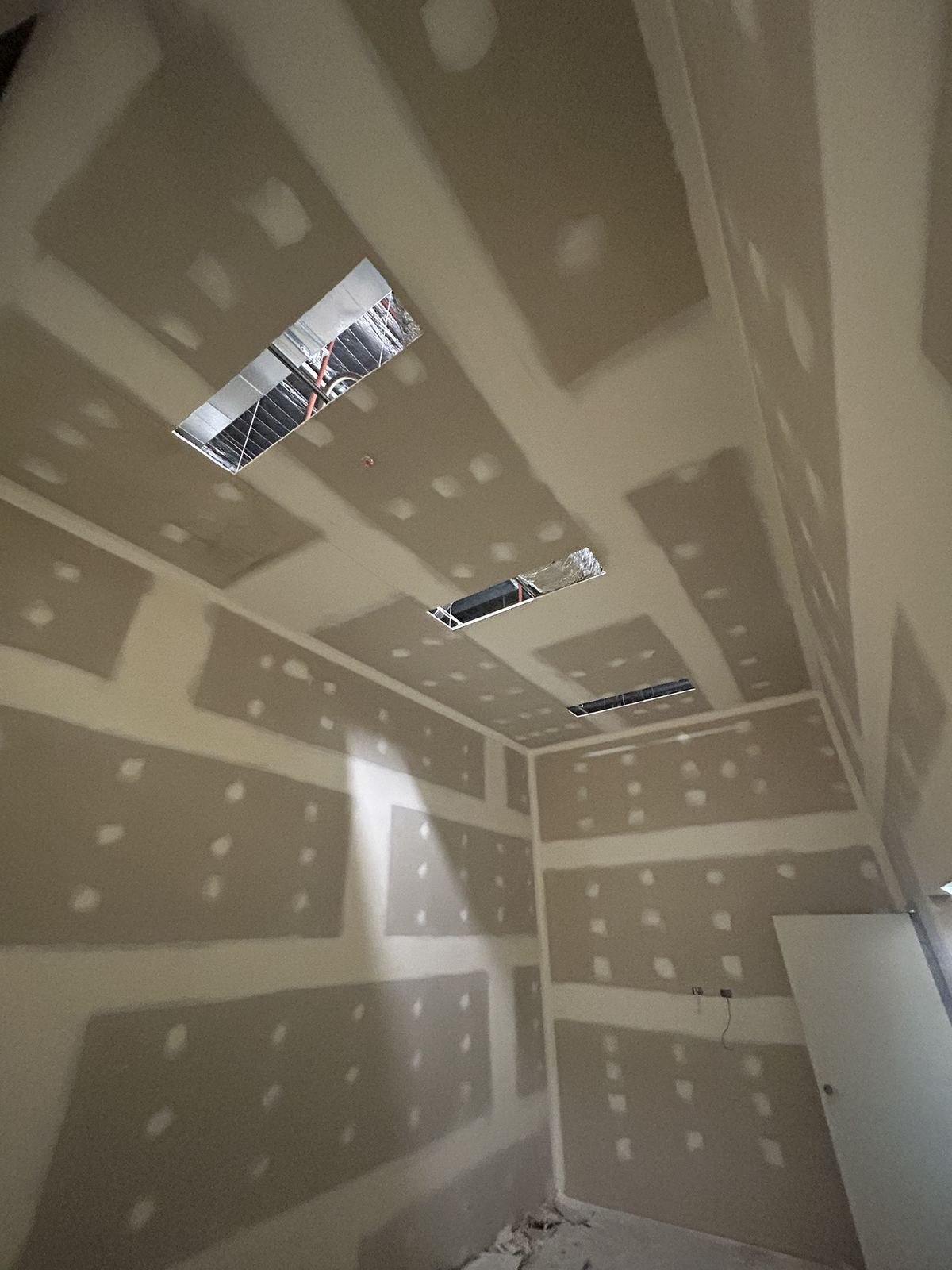 Plasterboard ceiling and walls with service openings, set and ready for paint, commercial fitout Perth