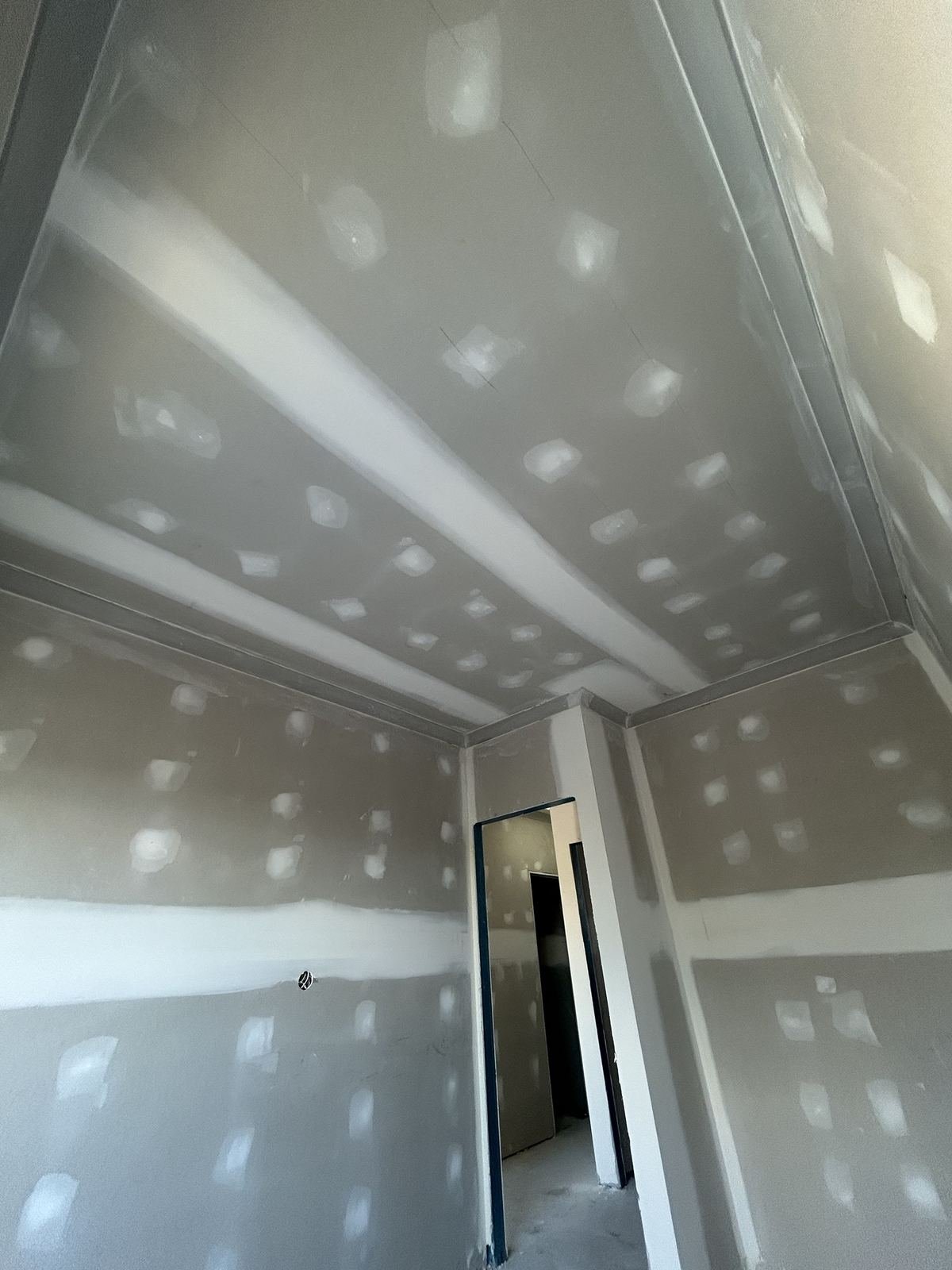 New build bedroom ceiling and walls set and ready for paint, Perth